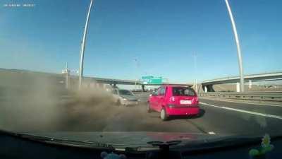 Russia. 2 cars collide and stop in the middle of the road causing a collision again.