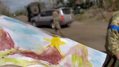 UA pov: A truck with supplies and children's letters for the Russian soldiers in Bairak was intercepted. The soldier reads a poem about how Russian soldiers aren't afraid of Nazis