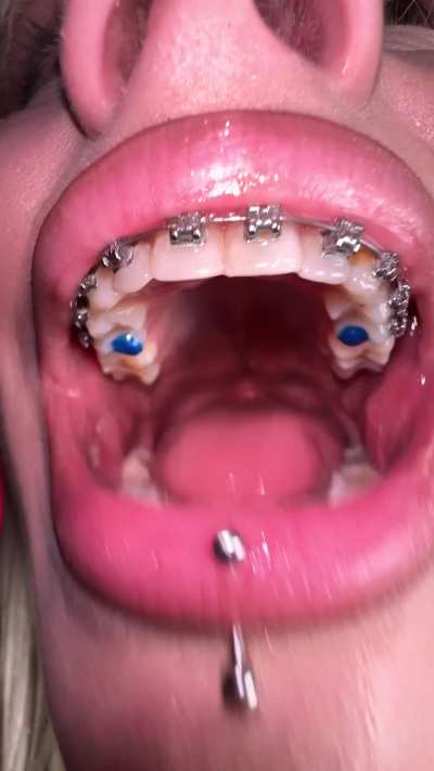 Piercings glowing with wild charm