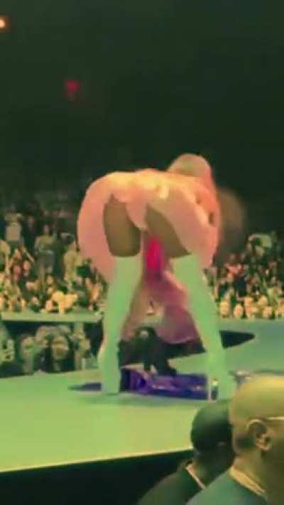 Shaking her tight ass on stage