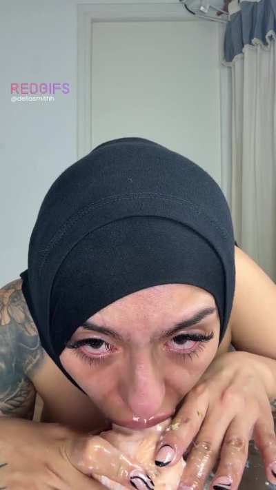 Black hijab and white whipped cream