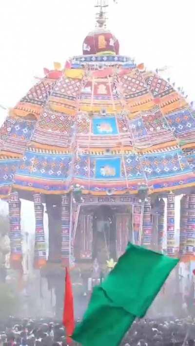 crowd dancing at a hindu chariot festival in india