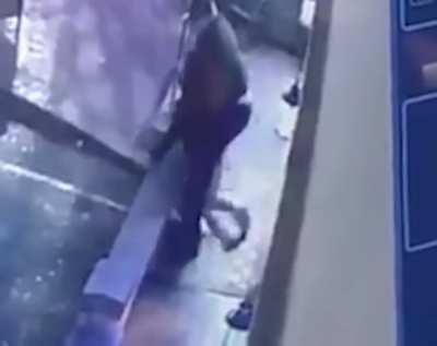 Bouncer beats the shit out of armed robber