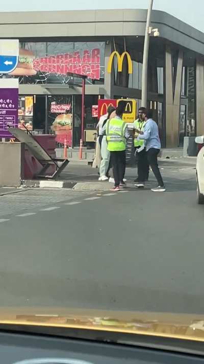 Fist fight outside Airport McD  (nobody wins a Mac) 