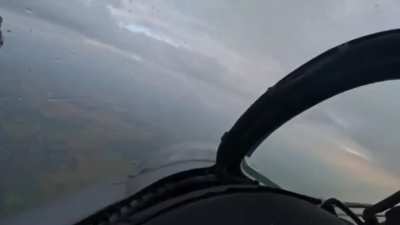 A Ukrainian Mi-24V helicopter equipped with a Uspu-24 gun mount and a YakB-12.7 machine gun shoots down a Russian Shahed-131/136 drone.