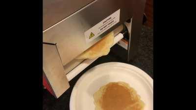 This hotel has a pancake robot