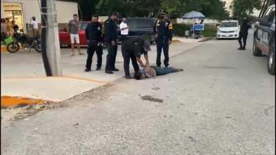 A woman died after the police broke her spine.