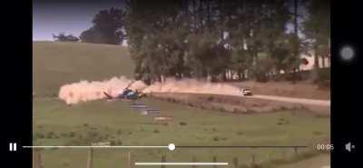 Helicopter camera captures a turn at a WRC rally