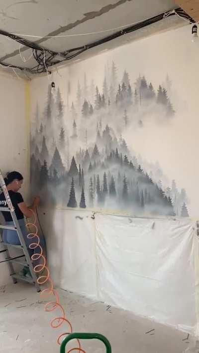 Foggy forest wall painting.
