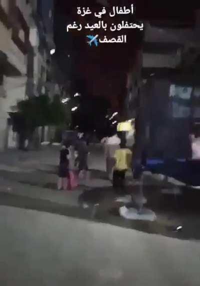 Unreal scene in Gaza minutes ago. Children still celebrating Eid during heavy IDF shelling.