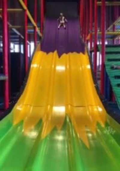 kid on a slide