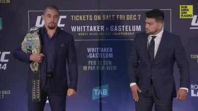 Awkward handshake between Whittaker and Gastelum