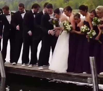 WCGW taking wedding photos on a pier