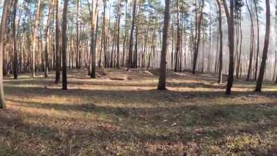 Combat footage of Ukrainian soldiers supported by a tank, taking up offensive positions close to Russian trench and waiting for the order to attack while their tank shelling the Russian positions. November 2022.