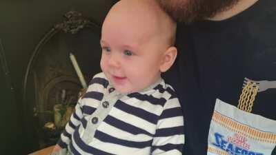 Local chicken comforts 4 month old baby.