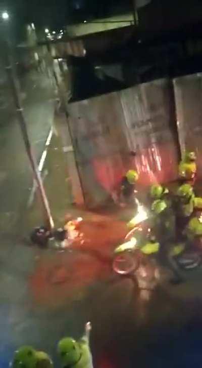 Colombian cops dont play they will chase you and beat you.. this is going on with the riots. Houses are being burned and people are being shot to death as well. Sad