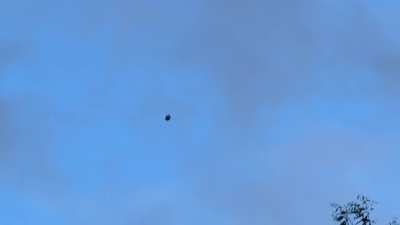 UFO seems to be rotating and wobbling at the same time