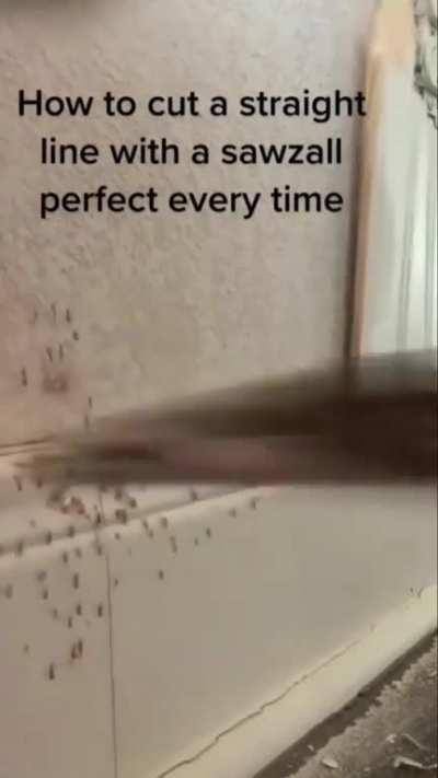 Man tries to film a tutorial video with a saw