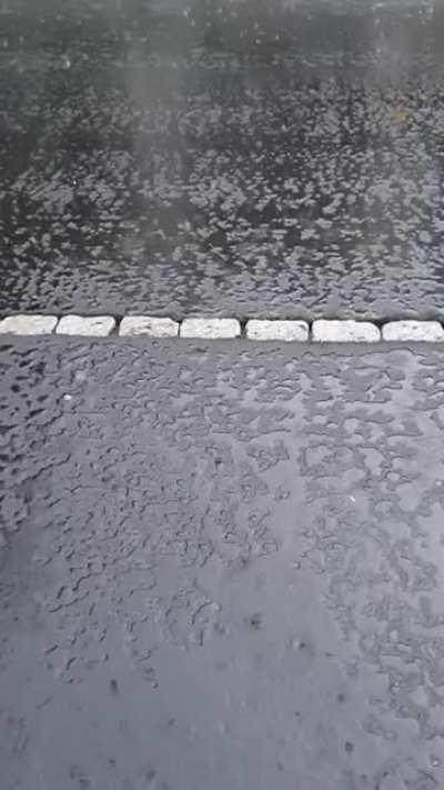 Rain on some freshly paved asphalt, feat. umbrella noises