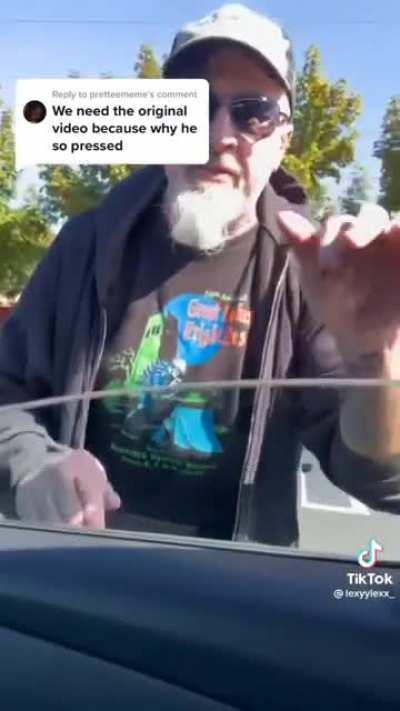 Aggressive man goes for a little ride. He's upset because the driver went on a GREEN light.