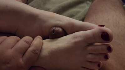 Recently pedicured with a Christmas color