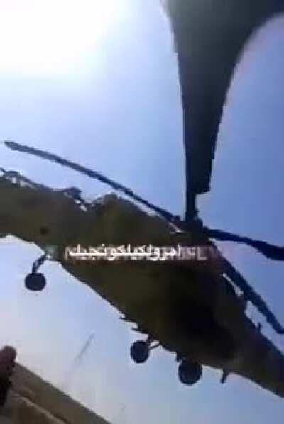 A Mi-35 attack helicopter of the Iraqi Air Force operating at extremely low altitude.