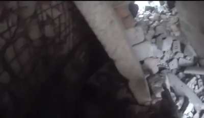 A grenade explodes close to an Ukrainian soldier, who survives, during fighting in the Donetsk region.