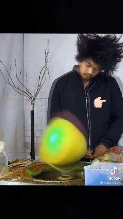 This man looks like he fell through that machine!