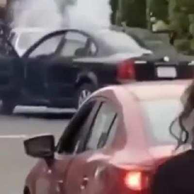 WCGW lighting firework on the street. (Gets it thrown back into his car)