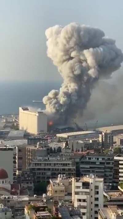 New angle of Beirut explosion showing fireworks going off before the detonation