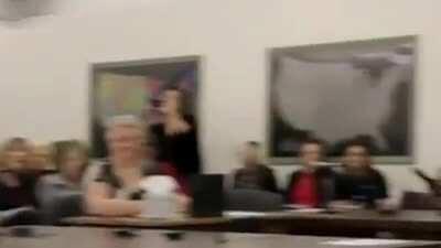 A farmer in Nebraska asking a pro-fracking committee member to honor his word of drinking water from a fracking location