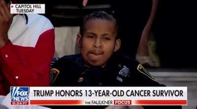 U.S. Democrat Representative Debbie Dingell rolls her eyes while Trump walks about boy with brain cancer