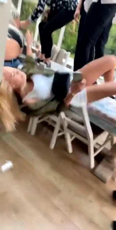 Drunk dancing on a table in high heels