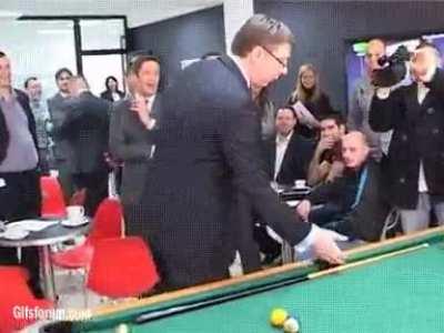 Serbian president playing pool