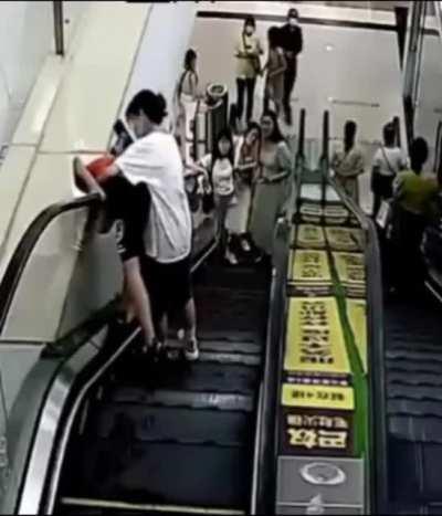 He tries to grab something and forgets about his head