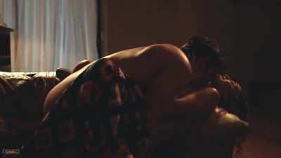 Javier Peña, on the sofa, with the afghan