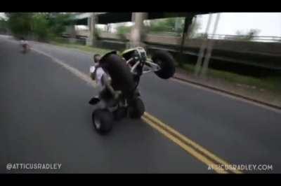 Performing a wheelie into oncoming traffic