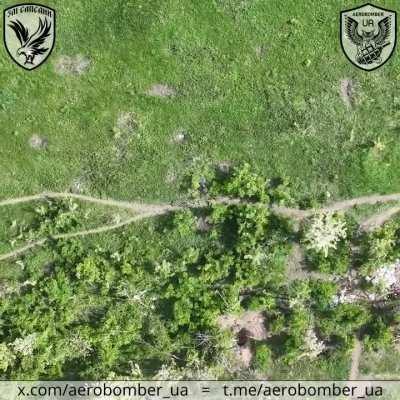 Aerobomber 30th OMBr strikes a running Russian soldier with a grenade