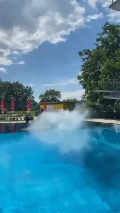Multi-flip somersault off the high board doesn't end well.