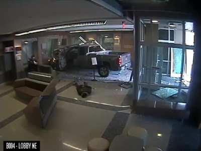 Man crashes truck into a police station lobby