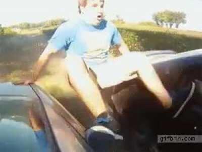 hanging between 2 cars