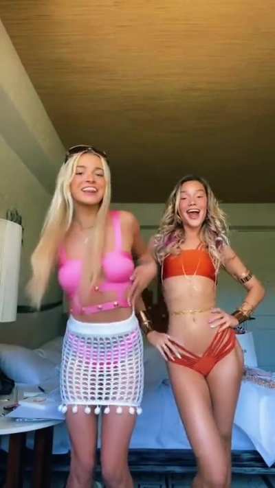 Olivia Ponton biceps flex with her friend