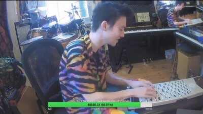 Jacob playing All Star by Smash Mouth on his harpejji