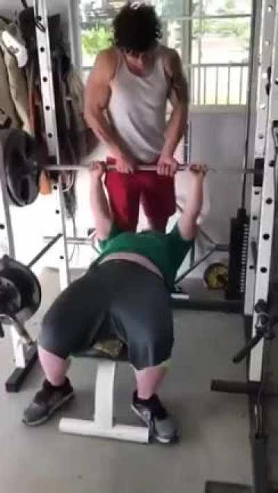 Garret, who has Down Syndrome, bench pressed a school record 355 pounds