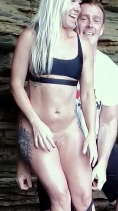 Got tricked and had her bikini bottom pulled down