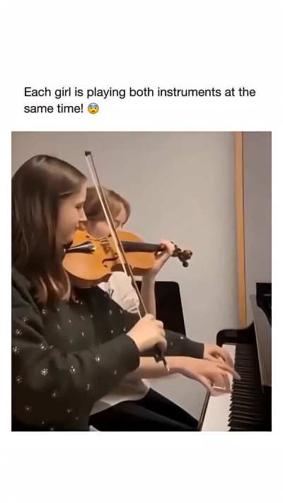 Both girls are playing both instruments at the same time 🤯