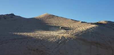 showing everyone that a beat up battle car can keep up on the dunes ;D