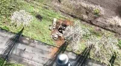 Ua pov: Drone drops a grenade right onto a Russian guy in a foxhole near Bakhmut. Source says Wagner. Warning : sad ending