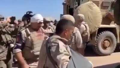 Three Russian servicemen, wounded during last IED blast attack on a patrol. Note that they were evacuated by Turkish MRAP.