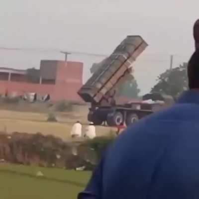 Village Folks Casually Watching a Missile Launch Up Close